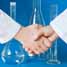Researchers shaking hands