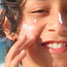 Boy with sunscreen on his face