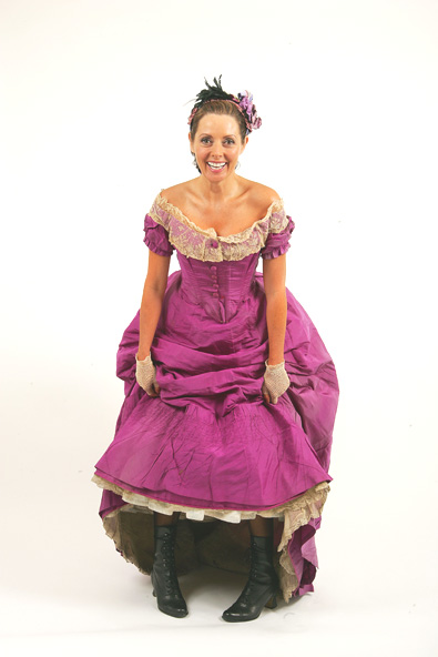 Carol Vorderman wearing a mauveine-dyed dress
