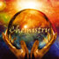 Two hands holding a glass ball containing the word 'chemistry'