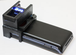 Mobile phone and device to detect bacteria