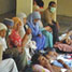 many people in camp accommodation after a natural disaster
