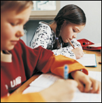young boy and girl, studying books