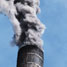 A plume of smoke, rising from a chimney stack