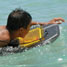 Boy surfing using the solar reactor boogie-board