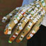hand with many UV sensors attached