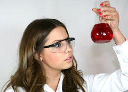 Student examining a volumetric flask