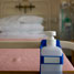 Plastic bottle on table near hospital bed