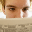 man reading newspaper