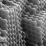 SEM image of dodecahedral particles in a close-packed lattice