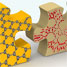 Two jigsaw puzzle parts fitting together, one part graphene and the other a zeolite