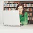 Woman in library with laptop