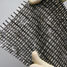 A stretchable matrix of transistors connected by an elastic conductor