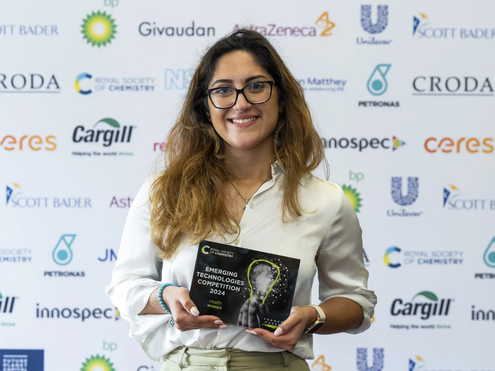 Ignota Labs' chief data science officer Layla Hosseini-Gerami holds the 2024 Health award at the Emerging Technologies Competition 2024 final