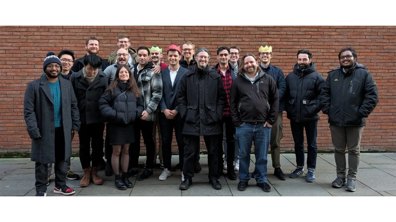 a group of people posing for a photo