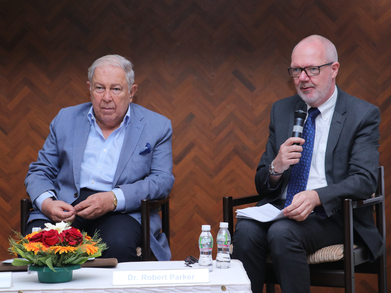 Image of Yusuf Hamied and Robert Parker seated at a press conference © Royal Society of Chemistry Image of Yusuf Hamied and Robert Parker seated at a press conference © Royal Society of Chemistry