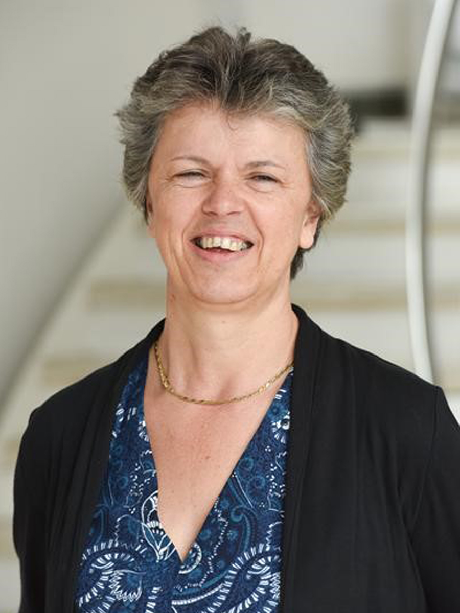A portrait photo of Professor Gill Reid A portrait photo of Professor Gill Reid