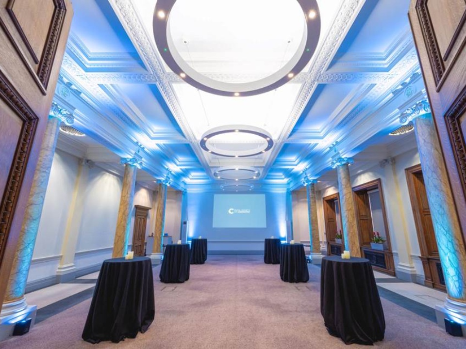science room with blue lighting and drinks and tables