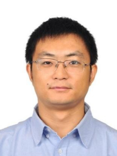 Headshot of Tian Ding, wearing thin rimmed glasses and a light blue shirt against a plain white background.