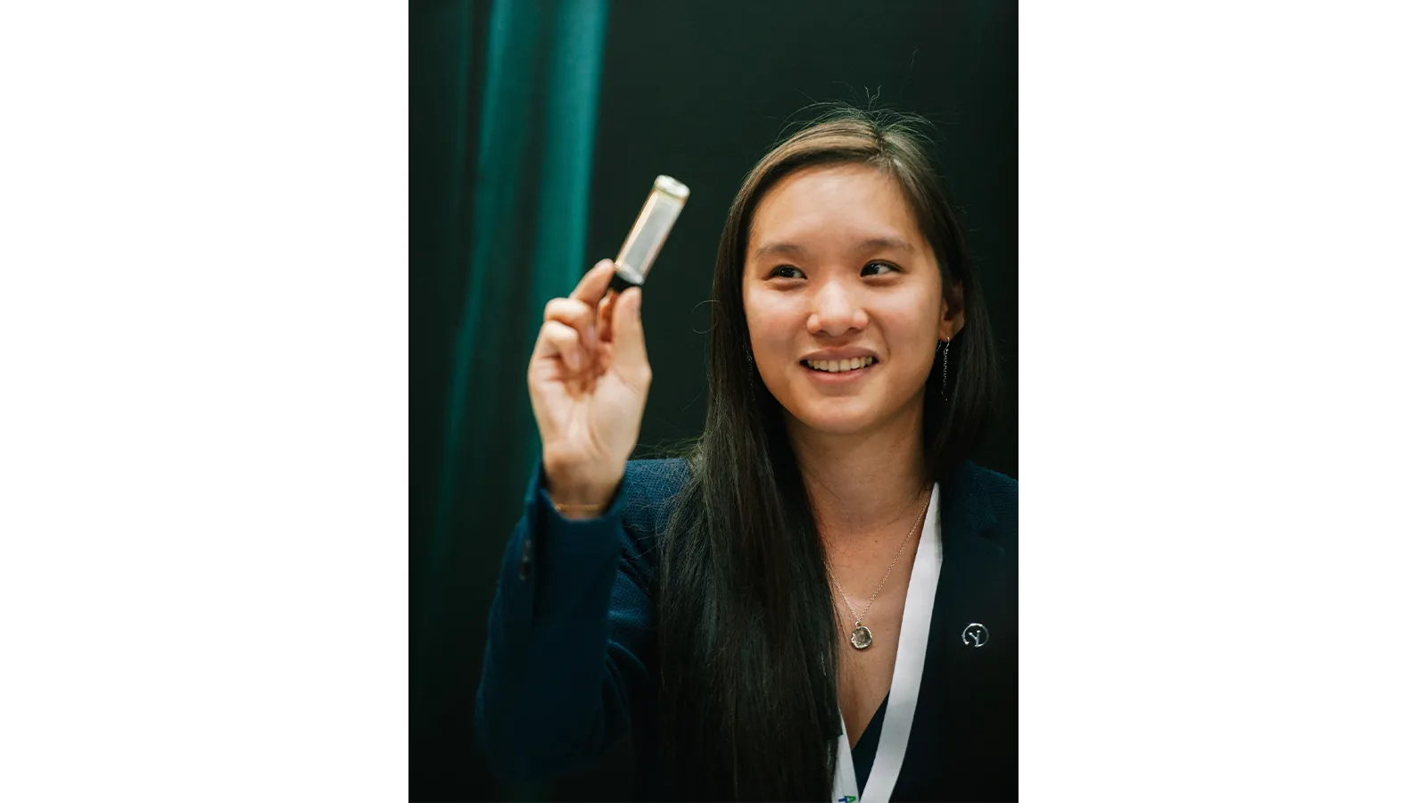 Dr Florence Huynh in a suit, smiling