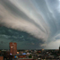 Storm cloud over city